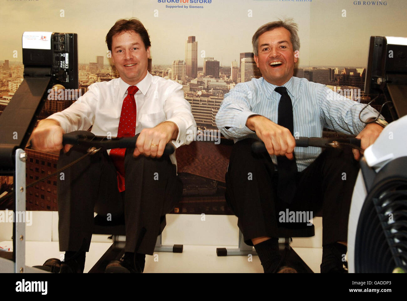 Nick Clegg (left) MP with Chris Huhne MP the two prospective Leaders of the Liberal Democratic Party, on the rowing machines at the CBI (Confederation of British Industry) Conference 2007, at the design centre in North London, this morning. Stock Photo