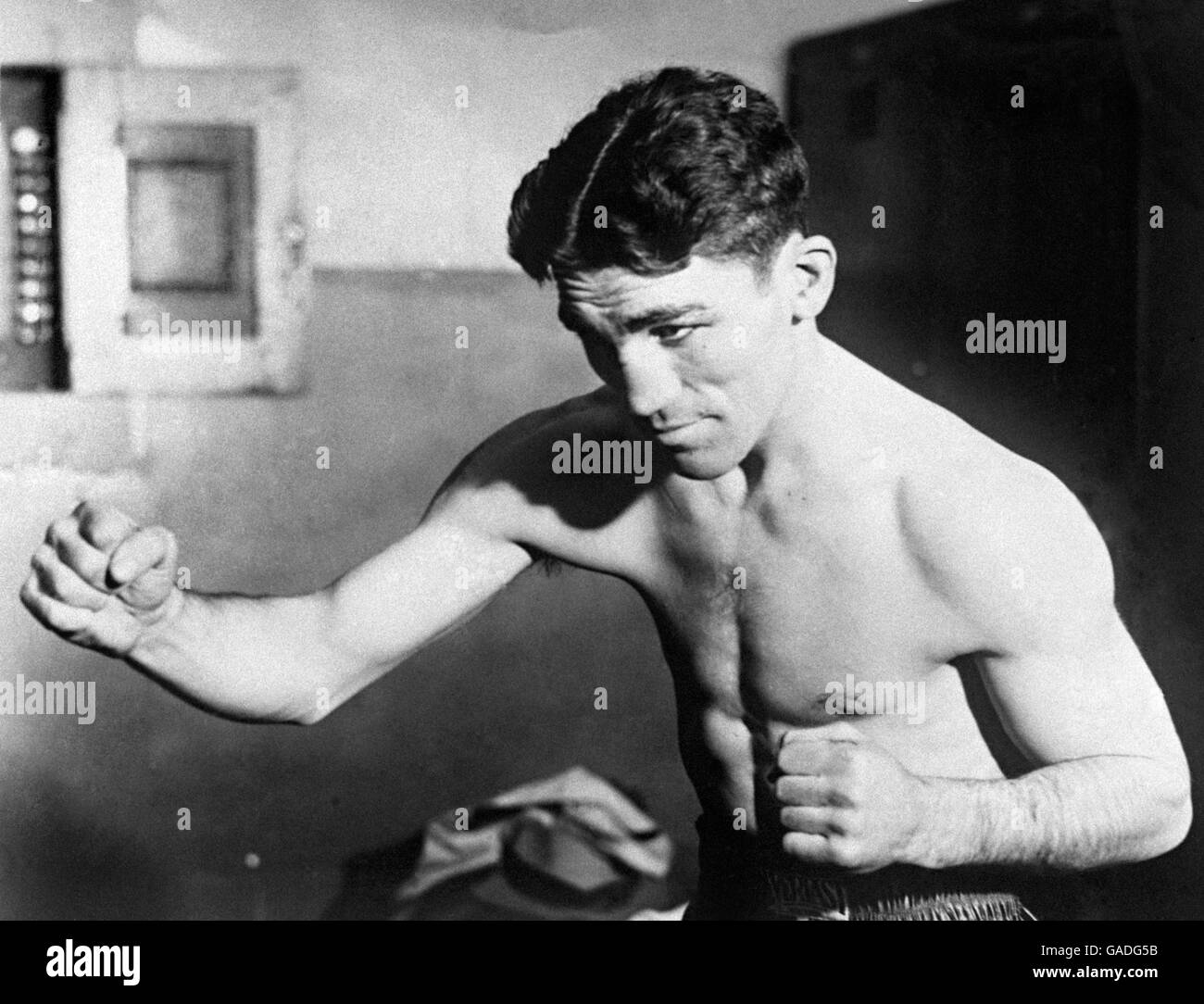 Sport - Boxing - US Boxer's in the 1930's. Christopher Battaglia, aka 'Battling Battalino' seen in a New York gym in 1930. he boxed in the featherweight division. Stock Photo