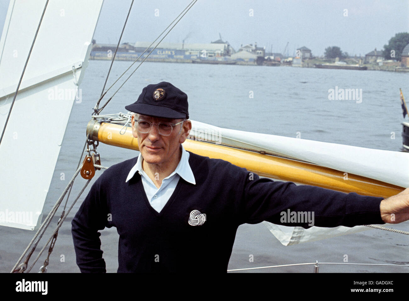 Francis Chichester aboard Gipsy Moth IV, the ship he commissioned specifically to sail single-handed around the globe, at Greenwich prior to his voyage. Stock Photo