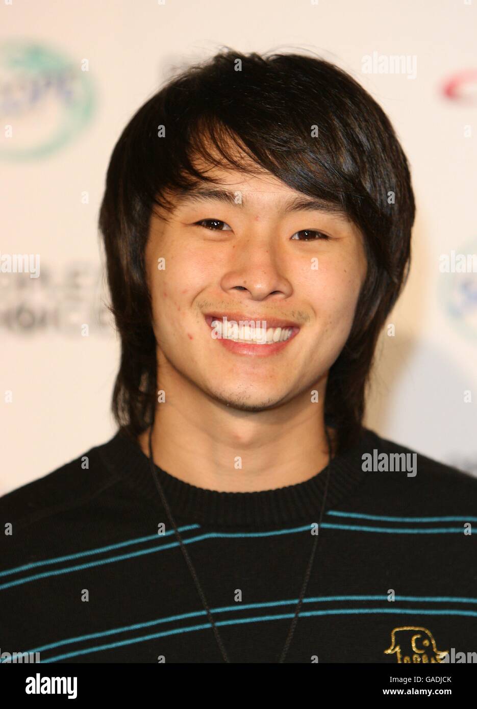 Justin Chon arrives at the 34th People's Choice Awards nominations party at the Area Nightclub in Los Angeles. Stock Photo