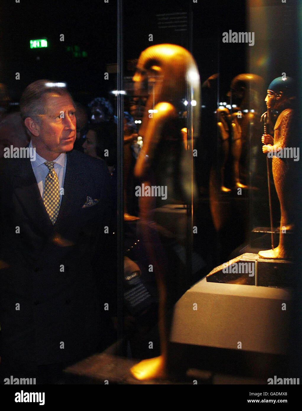 The Prince of Wales views statuettes during the ceremonial opening of the Tutankhamun exhibition at London's O2 centre. Stock Photo