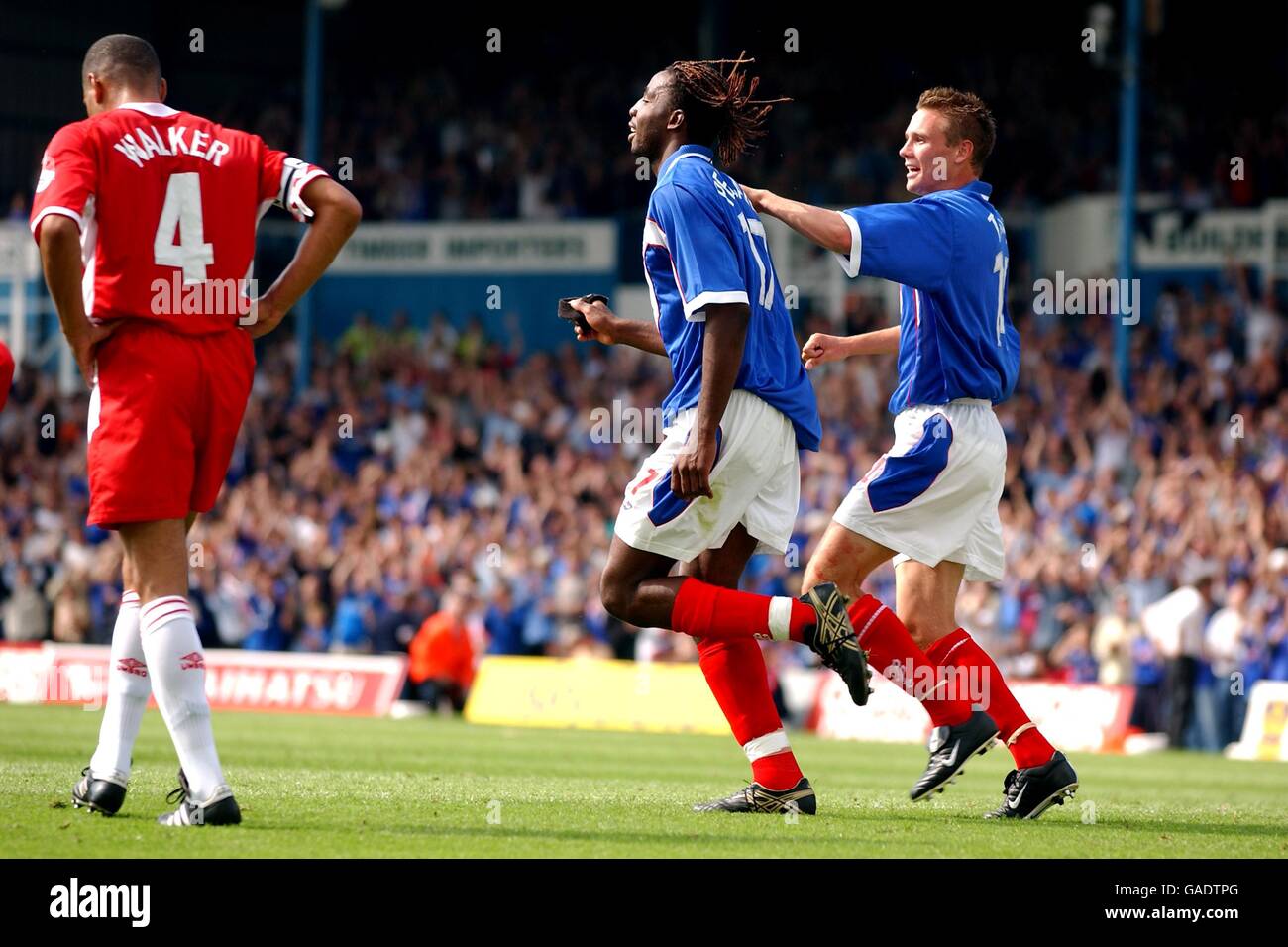 Soccer - Nationwide League Division One - Portsmouth v Nottingham Forest. Portsmouth's Vincent Pericard (c) celebrates scoring the 2nd goal much to the disgust of Nottingham Forest's Des Walker (l) Stock Photo