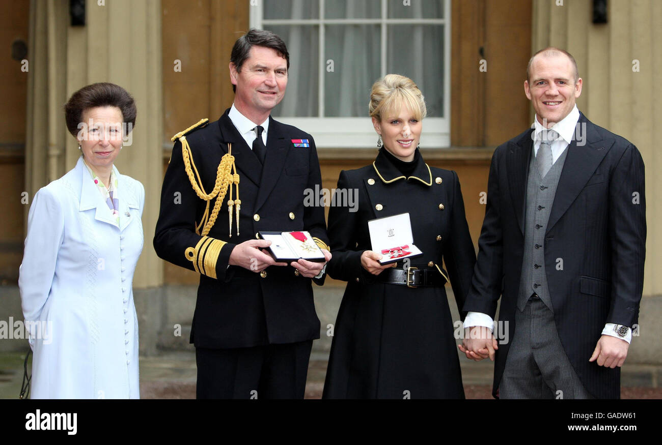 Zara Phillips with boyfriend Mike Tindall after picking up her MBE pictured  with her mum the Princess Royal and step-father Vice Admiral Timothy  Laurence, who was given the Most Honourable order of