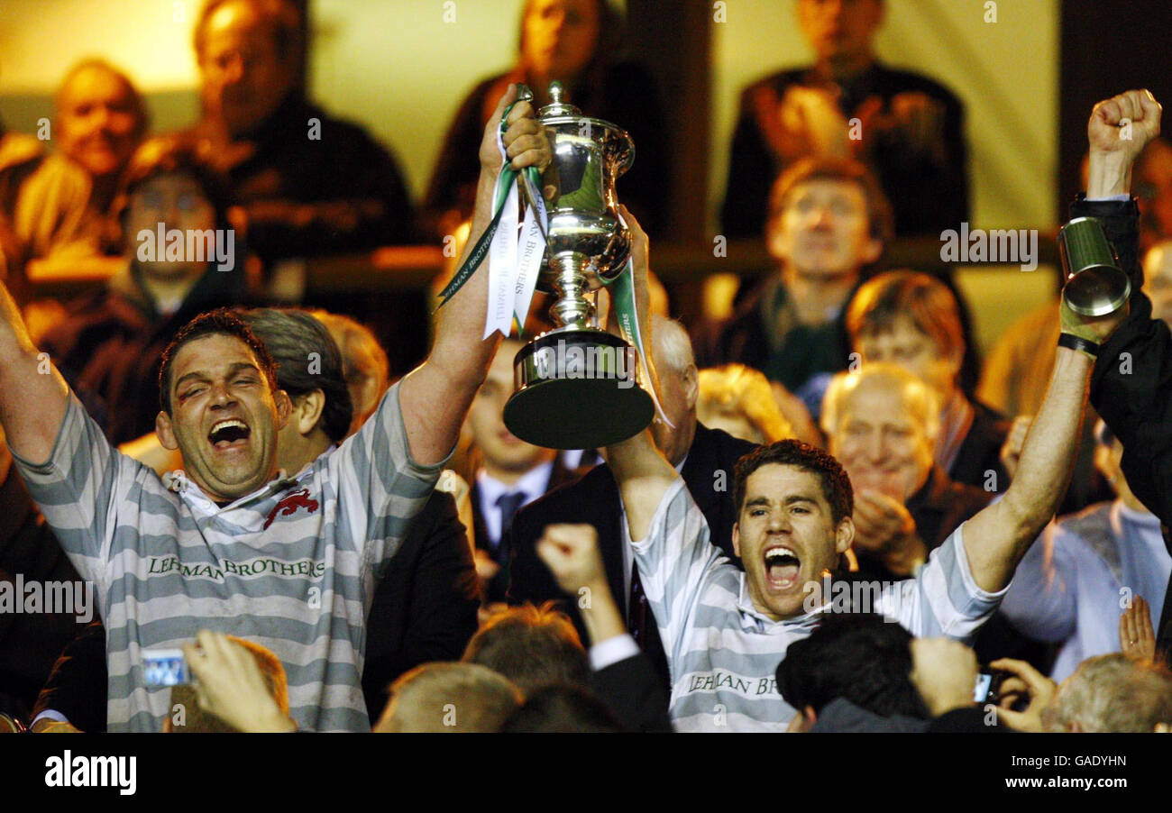 Cambridge University's John Blake (left) and captain Ross Blake lift the trophy after beating Oxford University during The 2007 Lehman Brothers Varsity Match at Twickenham, London. Stock Photo