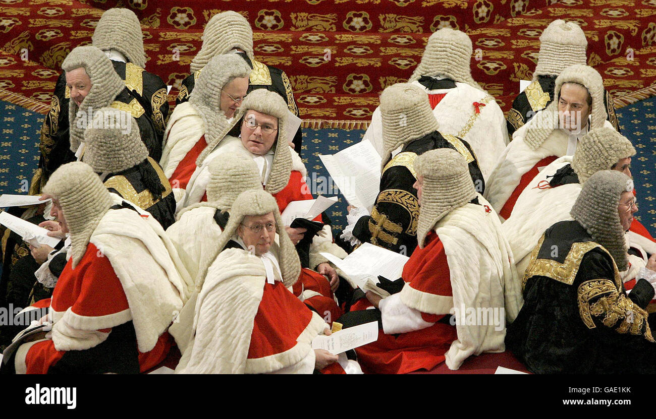 Law Lords sit on the cross benches as they wait in the House of Lords