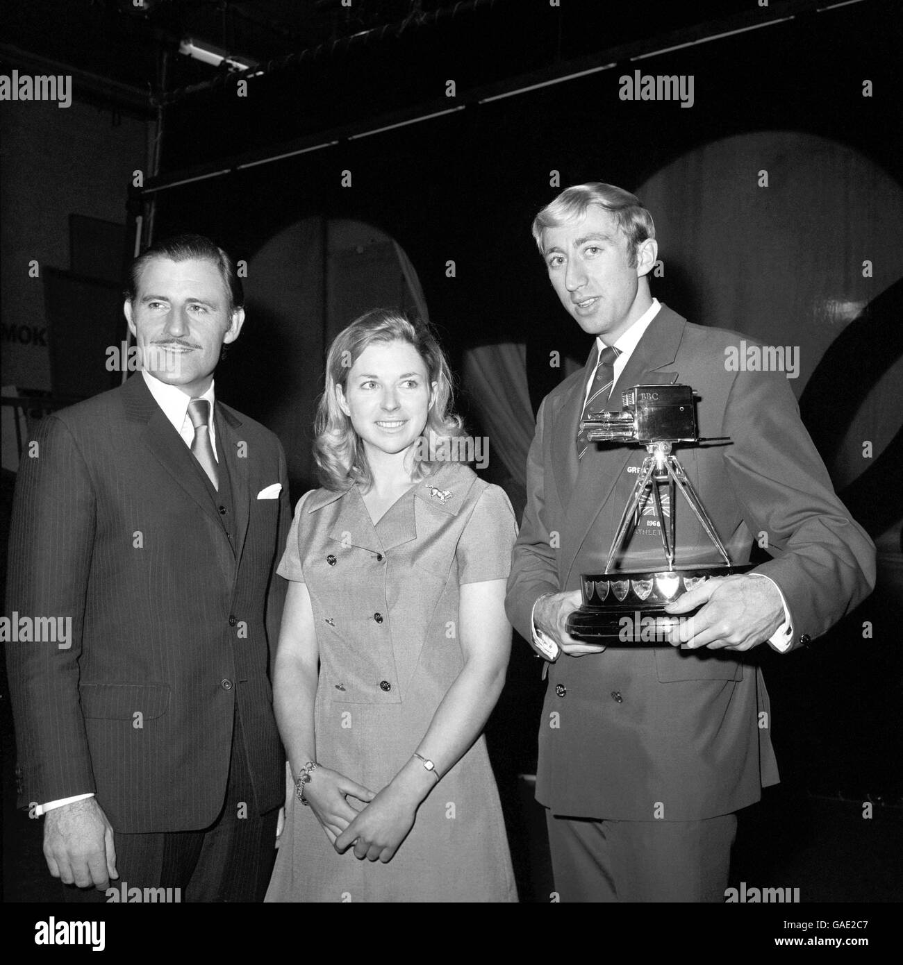 Winners of the BBC's 'Sportsview Personalities of 1968' awards after the presentations at the Television Theatre, Golders Green, London tonight. Left to right: Graham Hill, world racing champion, who was second; Marion Coakes, silver medallist in Olympic individual show jumping in the Mexico Olympics, third; and David Hemery, Olympic gold medallist who won the 400 metres hurdles at Mexico. He won the top sports award and is seen holding the trophy that was presented to him tonight. Stock Photo