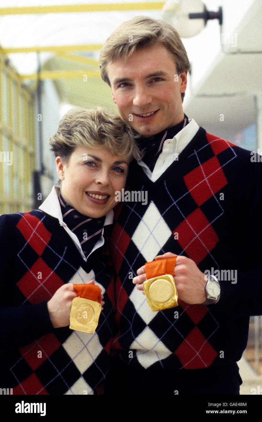 Great Britain's Jayne Torvill and Christopher Dean pose with their Gold medals for Ice Dancing. Stock Photo