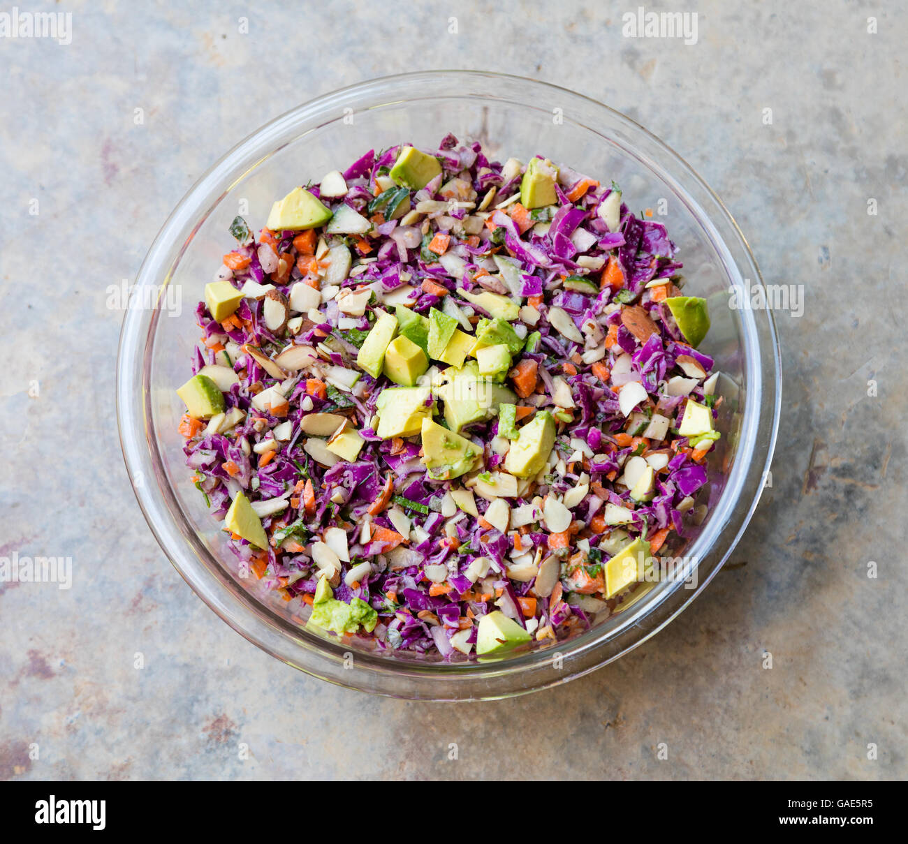 Top view of rainbow slaw with Avocado in a bowl Stock Photo