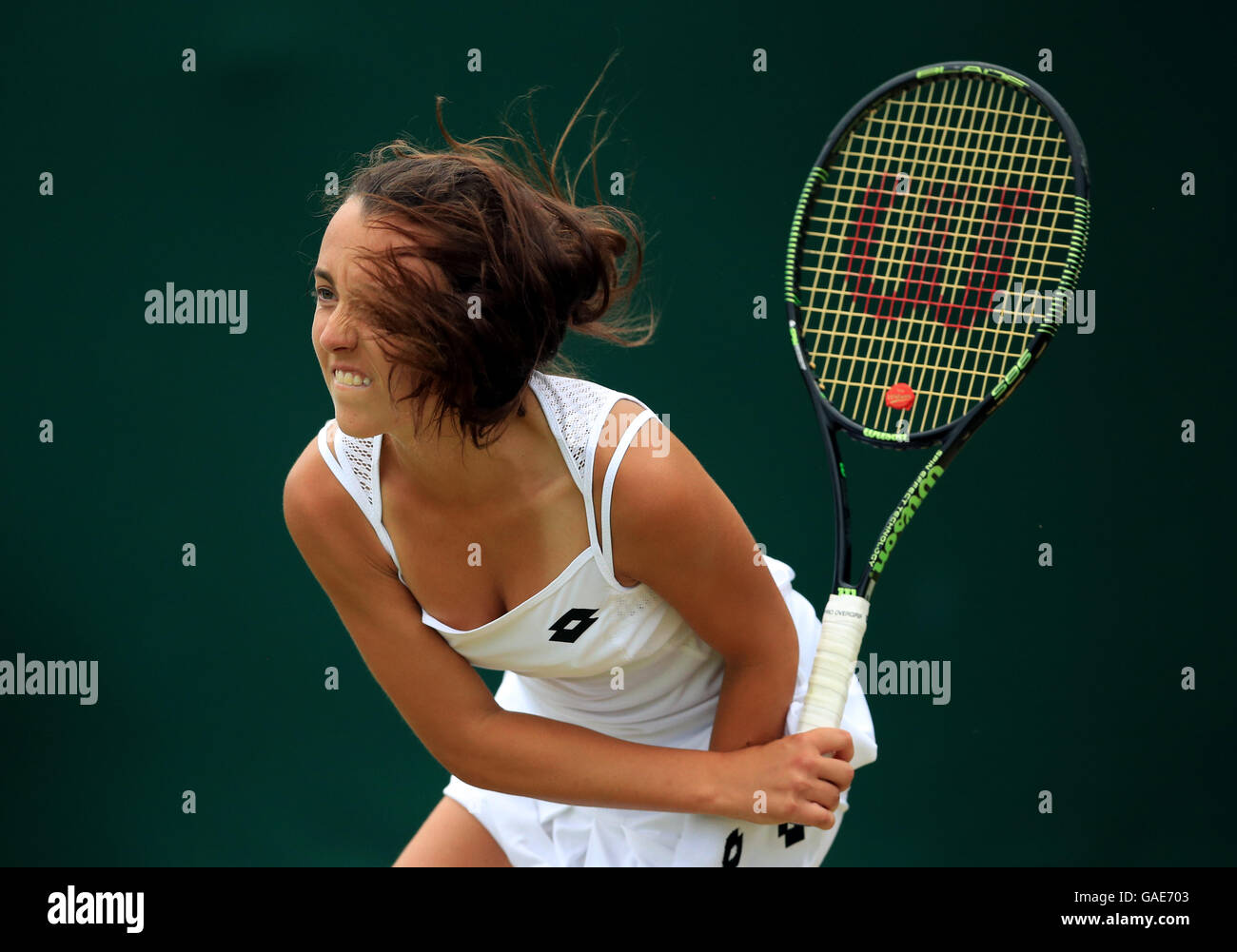 Tatiana Pieri in action in the girls singles on day seven of the Wimbledon  Championships at the All England Lawn Tennis and Croquet Club, Wimbledon.  PRESS ASSOCIATION Photo. Picture date: Monday July