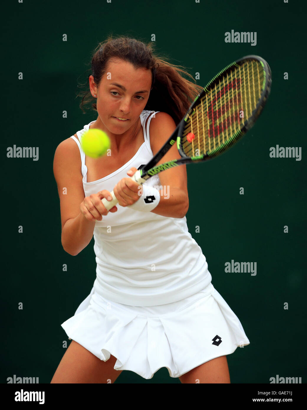 Tatiana Pieri in action in the girls singles on day seven of the Wimbledon  Championships at the All England Lawn tennis and Croquet Club, Wimbledon  Stock Photo - Alamy