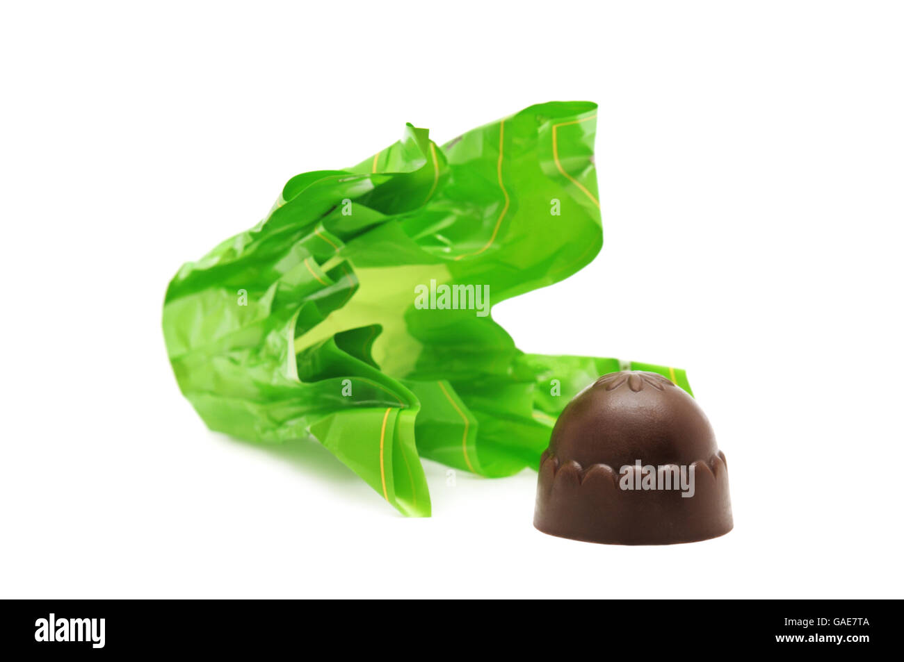 Chocolates and candy wrapper isolated on a white background Stock Photo