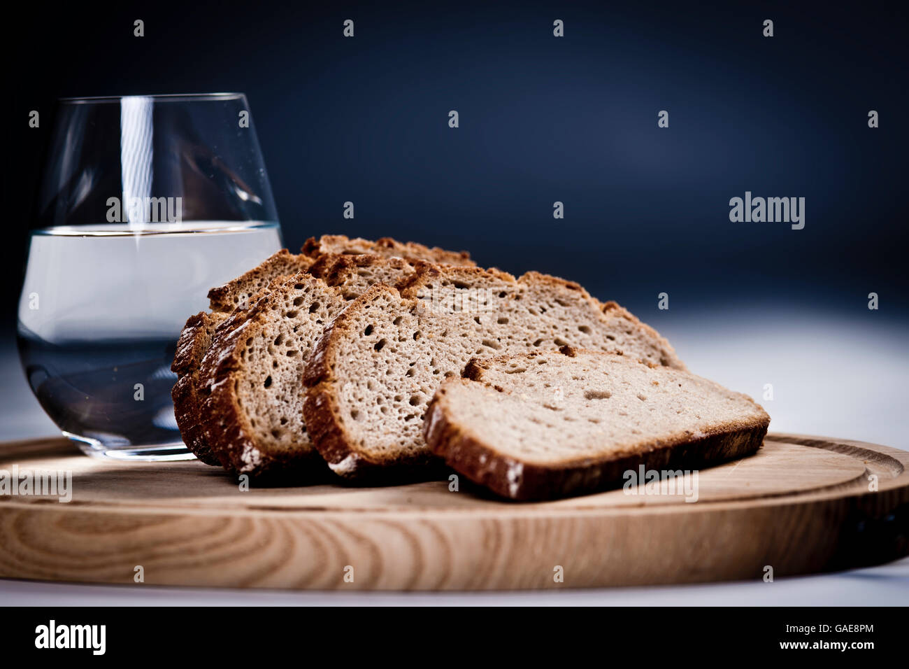 Glass of water and slices of bread Stock Photo