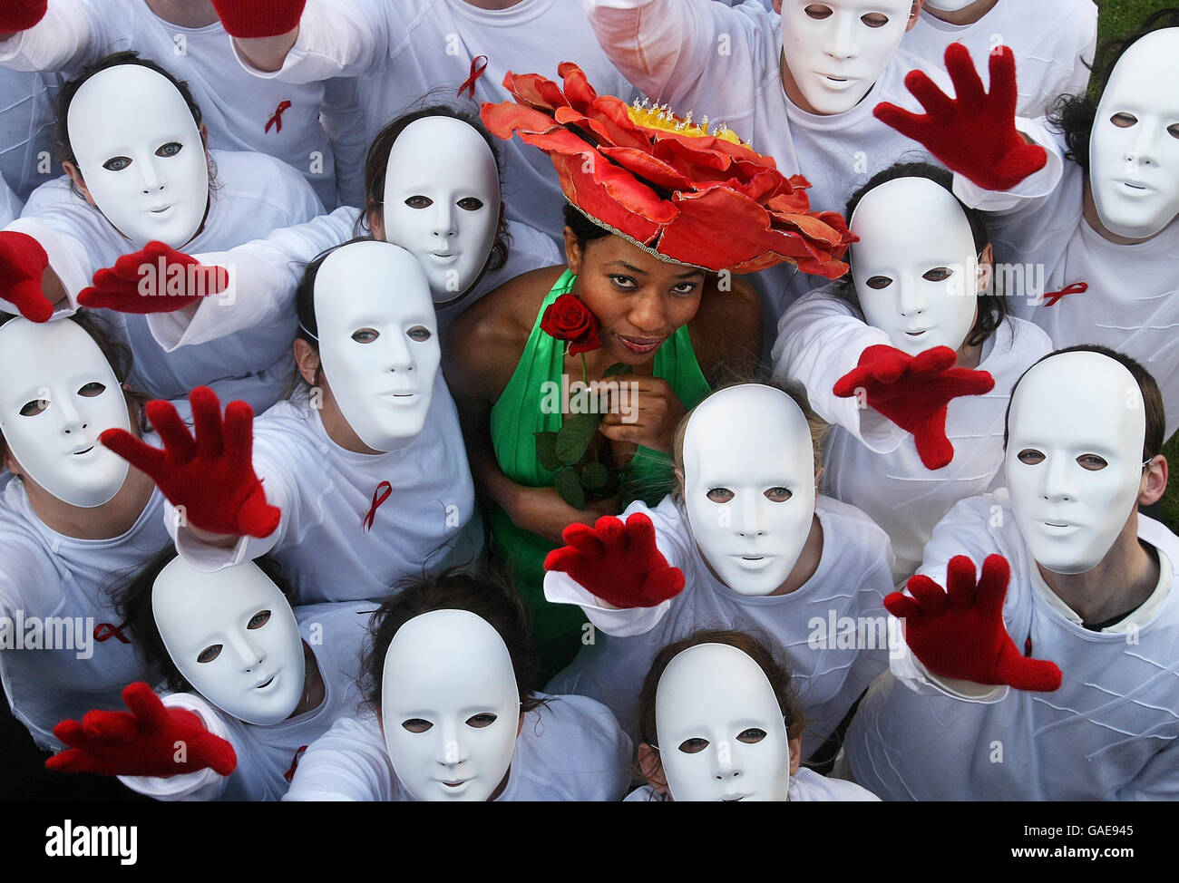 Model Joyce Matemba with students dressed as mannequins to illustrate Africa's faceless, voiceless majority TO MARK World Aids Day in the gardens of Mansion House, Dublin. Stock Photo