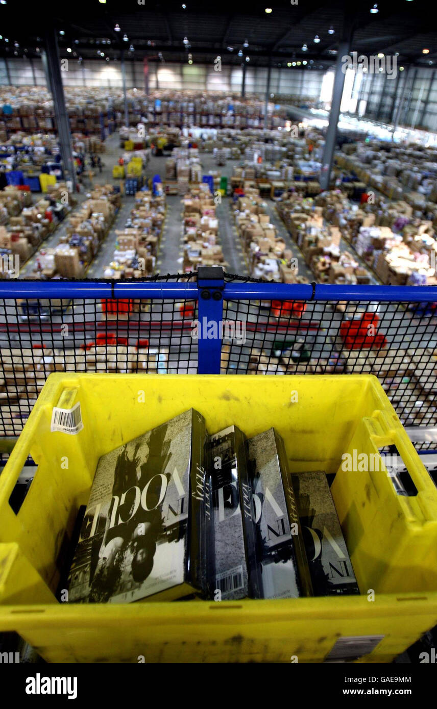 Parcels are prepared for dispatch at the Amazon.co.uk distribution centre near Milton Keynes. Stock Photo