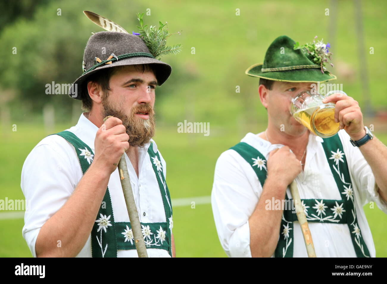 Men wearing traditional costume during Viehscheid, separating the cattle after their return from the Alps, Thalkirchdorf Stock Photo