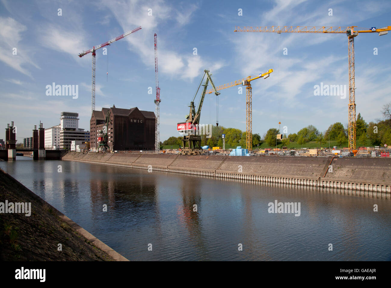 Construction site with cranes, Innenhafen port, Duisburg, Ruhrgebiet area, North Rhine-Westphalia Stock Photo