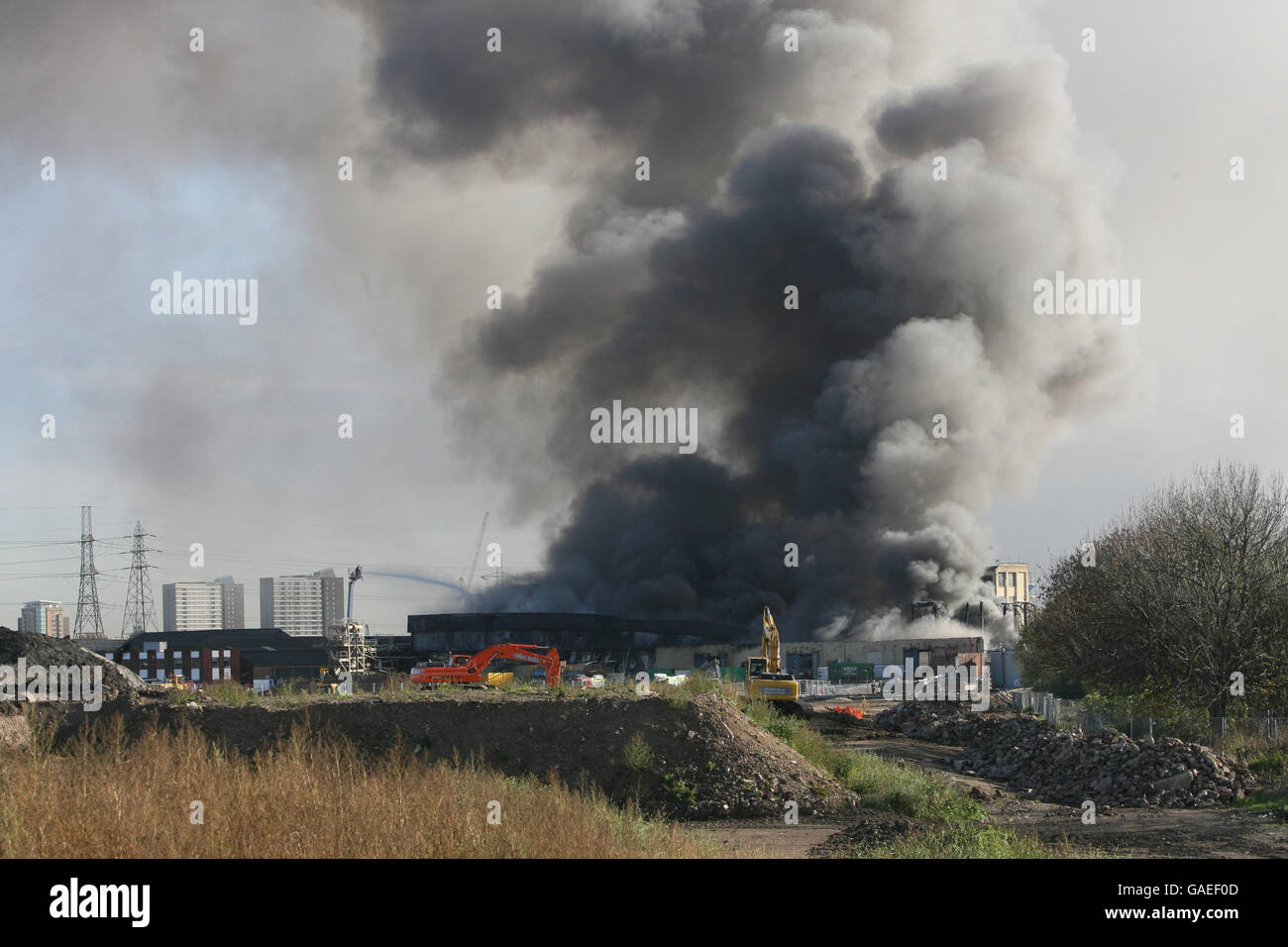 Smoke bellows from a huge fire on the 2012 Olympic site in Stratford