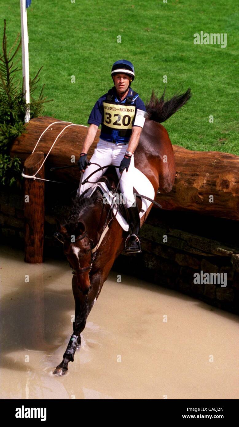 Equestrianism - Chatsworth Horse Trials. Andrew Hoy takes a jump on Silkstream Stock Photo