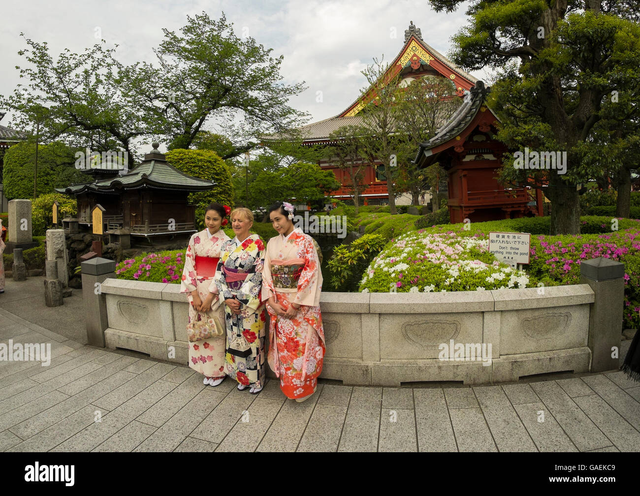 Three ladies in kimono dresses in Asakusa, Tokyo. Stock Photo