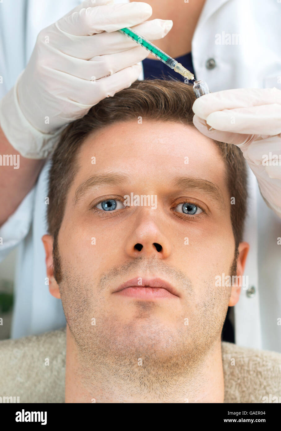 Handsome man is getting injection. Concept of aesthetic beauty Stock ...