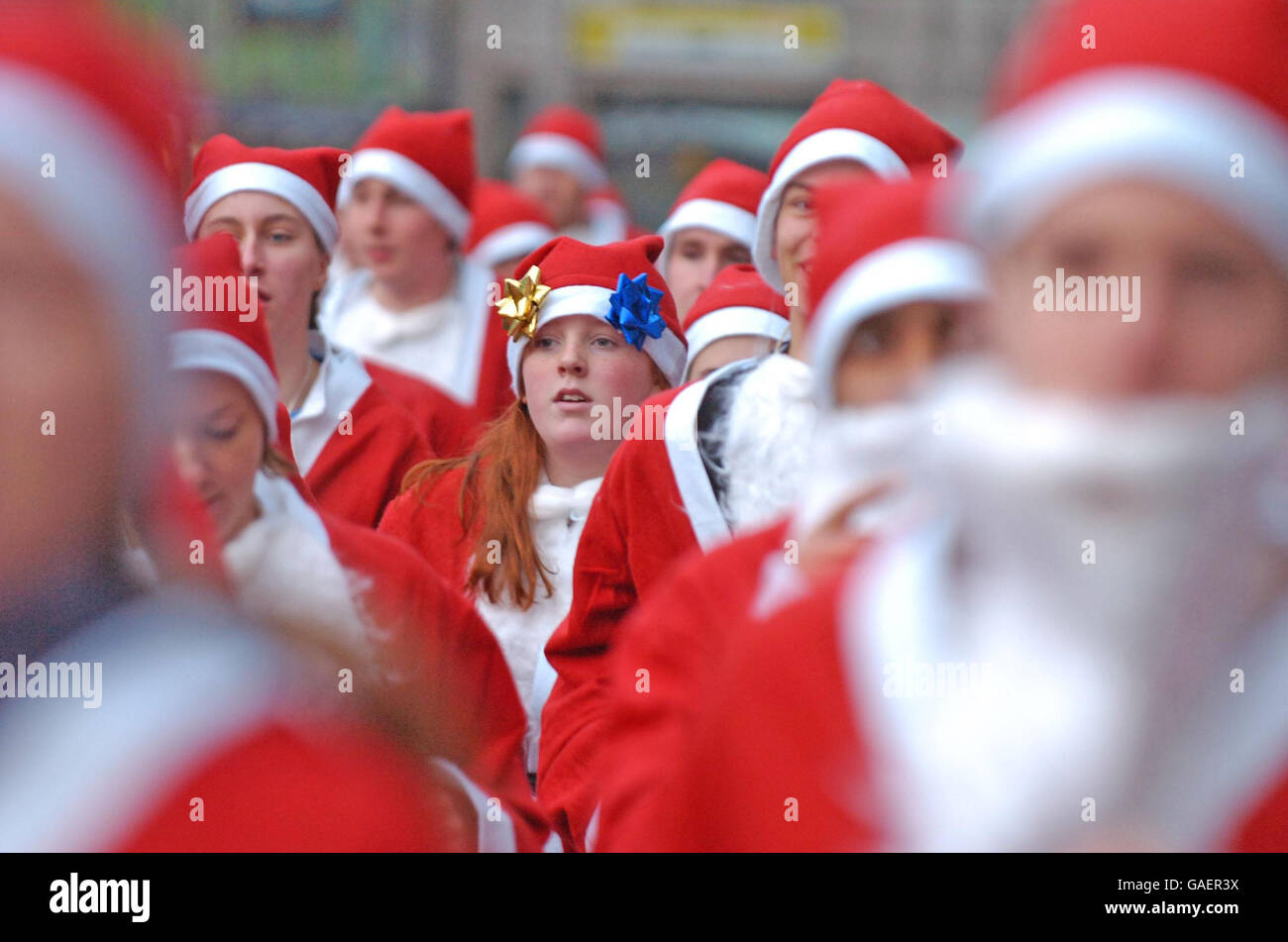 Competitors take part in the 2007 Liverpool Santa Dash, a 5K charity run around the city. Stock Photo