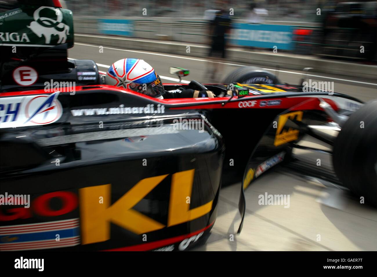 New British Minardi driver Anthony Davidson speeds out of the pits. His ...