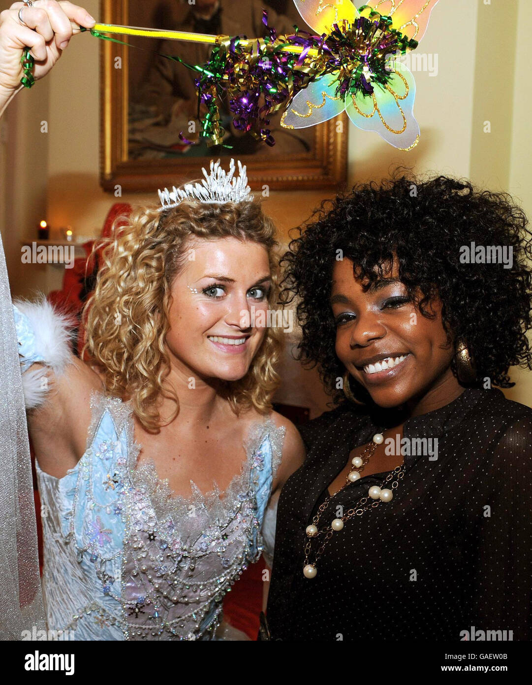 Alisha Bennett (right), a recent contestant on TV show the X factor, with a fairy at the Chancellor of the Exchequer's annual children's party at 11, Downing Street this afternoon. Stock Photo