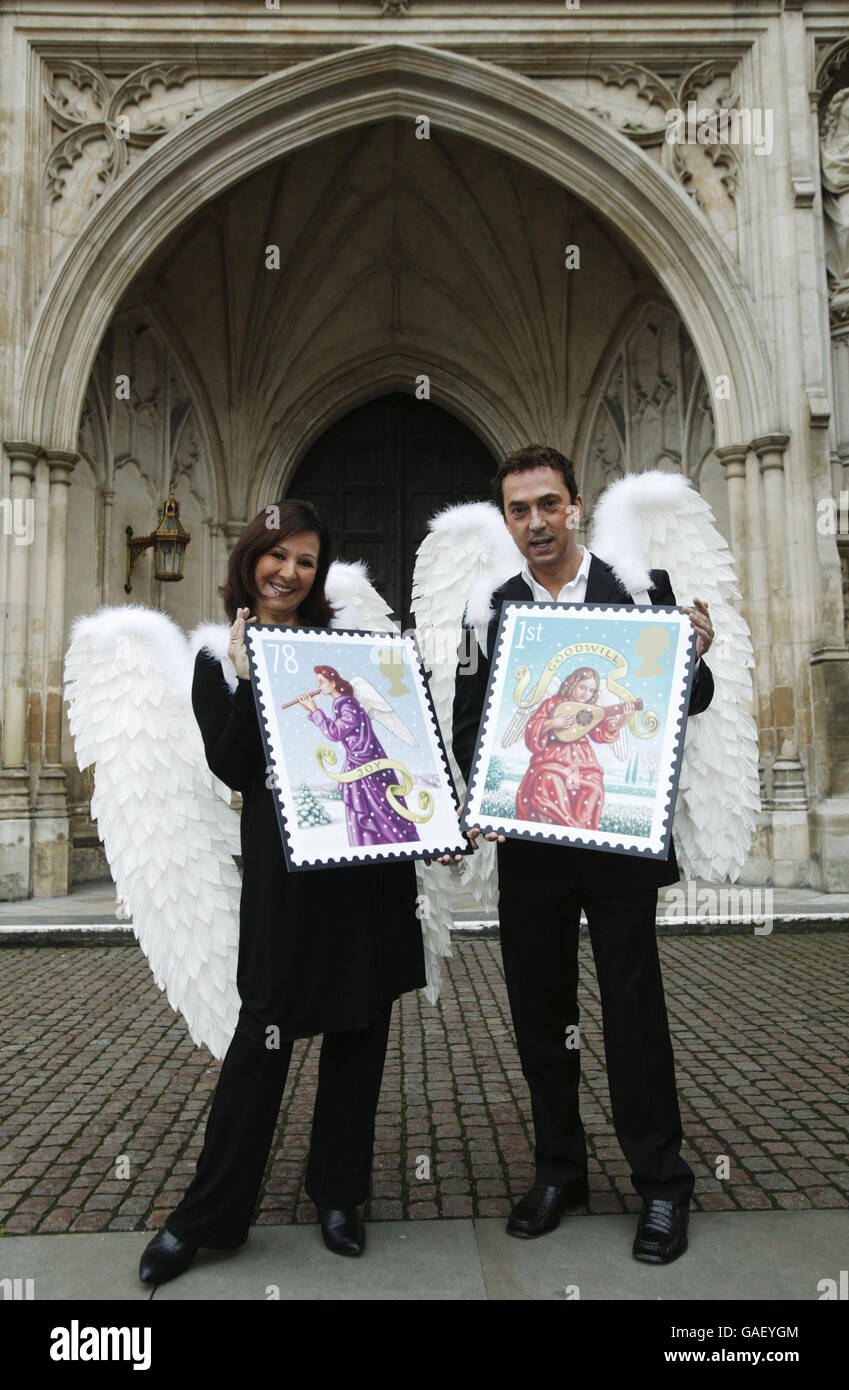 Strictly Come Dancing judges Bruno Tonioli (left) and Arlene Phillips promoting Royal Mail's Christmas stamps at Westminster Abbey, London. Stock Photo