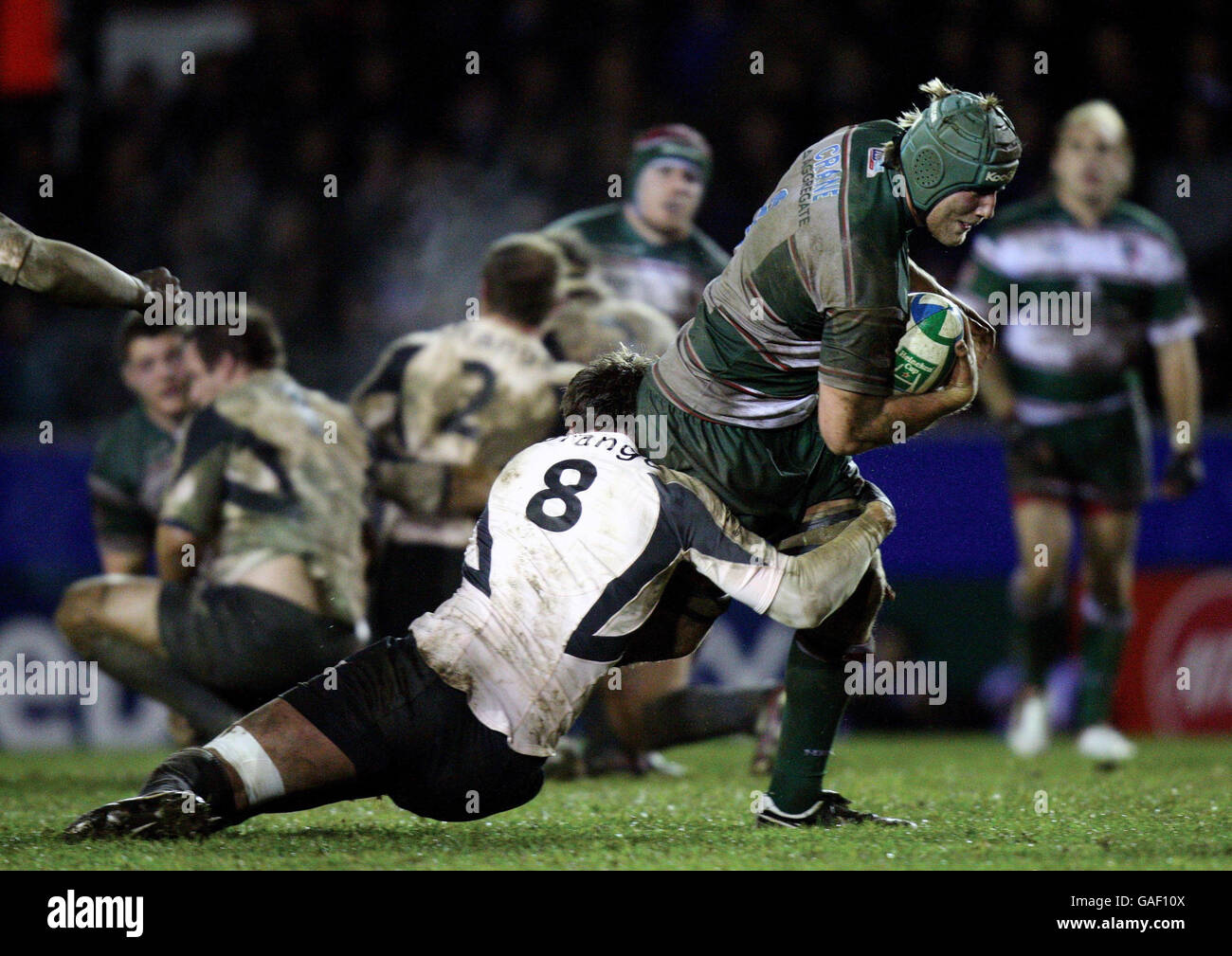 Leicester's Jordan Crane is tackled by Shaun Sowerby of Toulouse during the Heineken Cup match at Welford Road, Leicester. Stock Photo