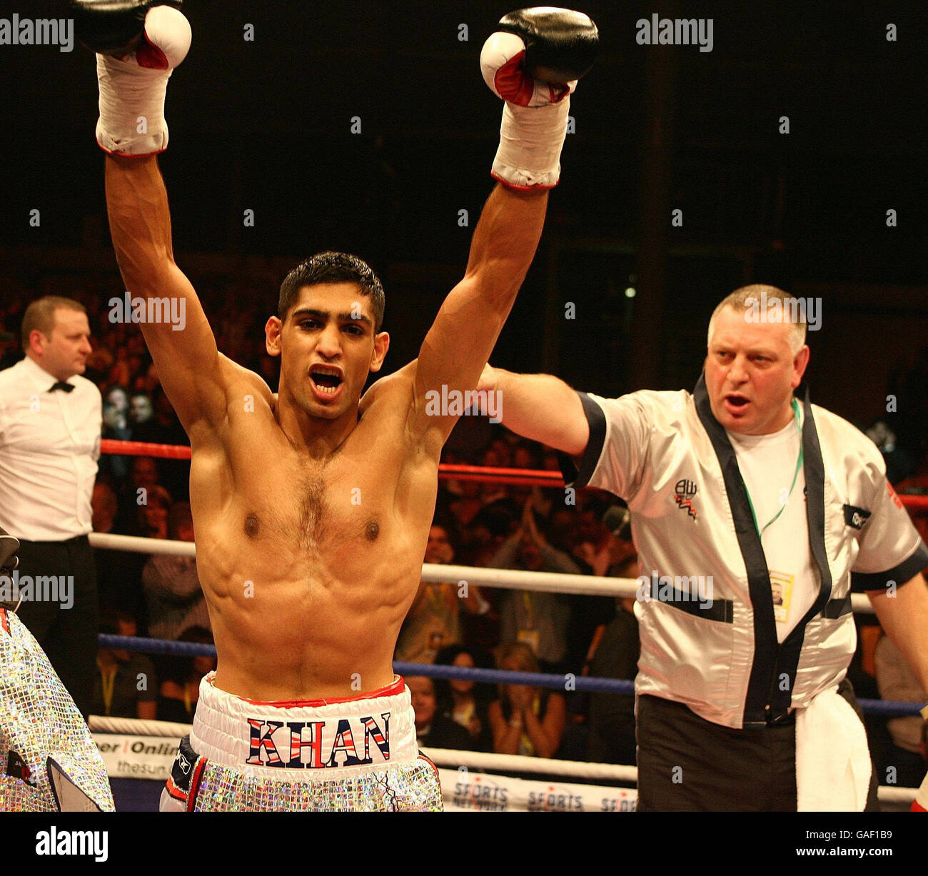Amir Khan celebrates his first round win over Graham Earl in the Commonwealth Lightweight Title fight at the Bolton Arena, Bolton. Stock Photo