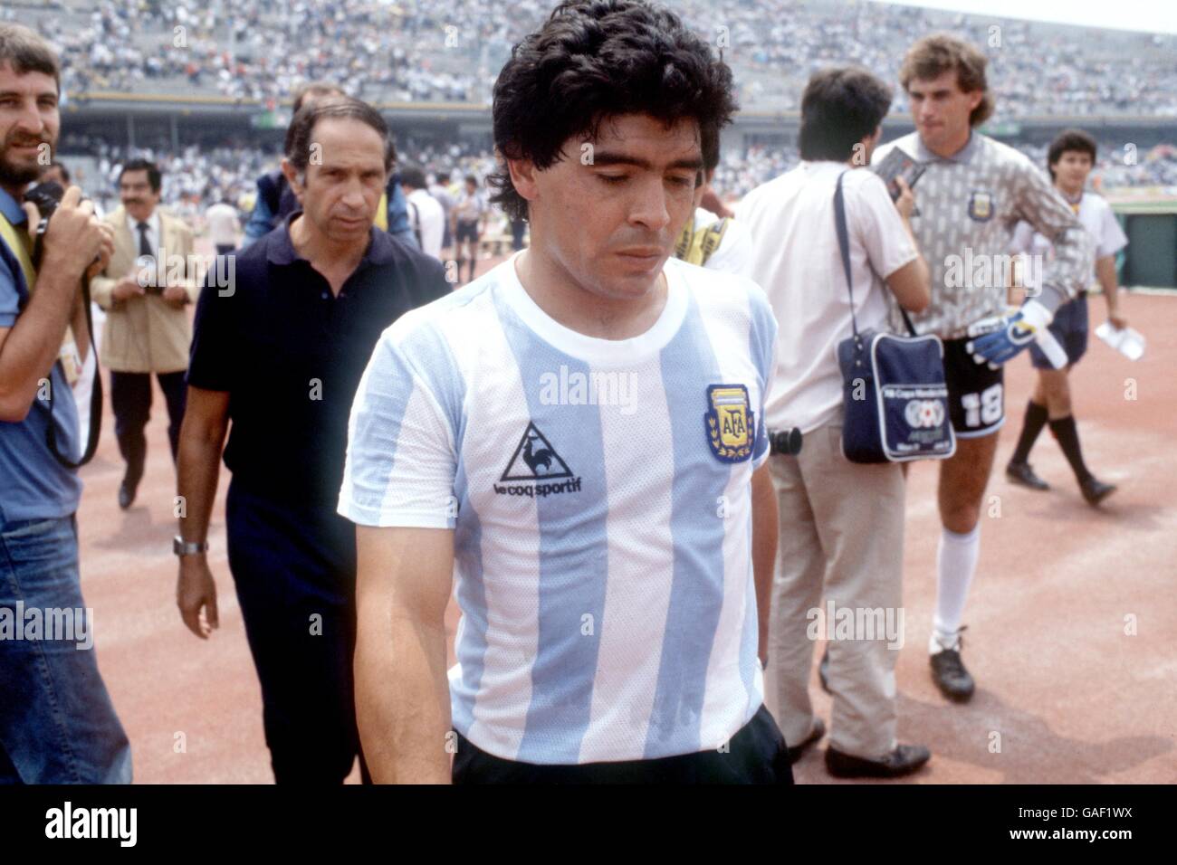 Soccer - World Cup Mexico 1986 - Group A - Argentina v Bulgaria. Argentina's Diego Maradona walks back to the dressing room after the match Stock Photo