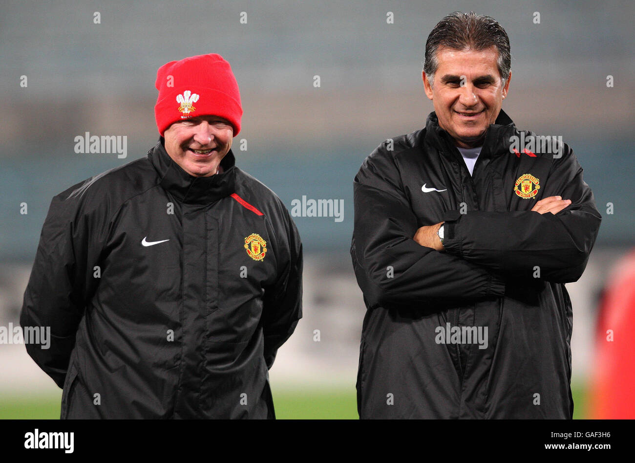 Manchester United manager Sir Alex Ferguson with assistant coach Carlos  Queiroz during a training session at the Stadio Olimpico, Rome Stock Photo  - Alamy