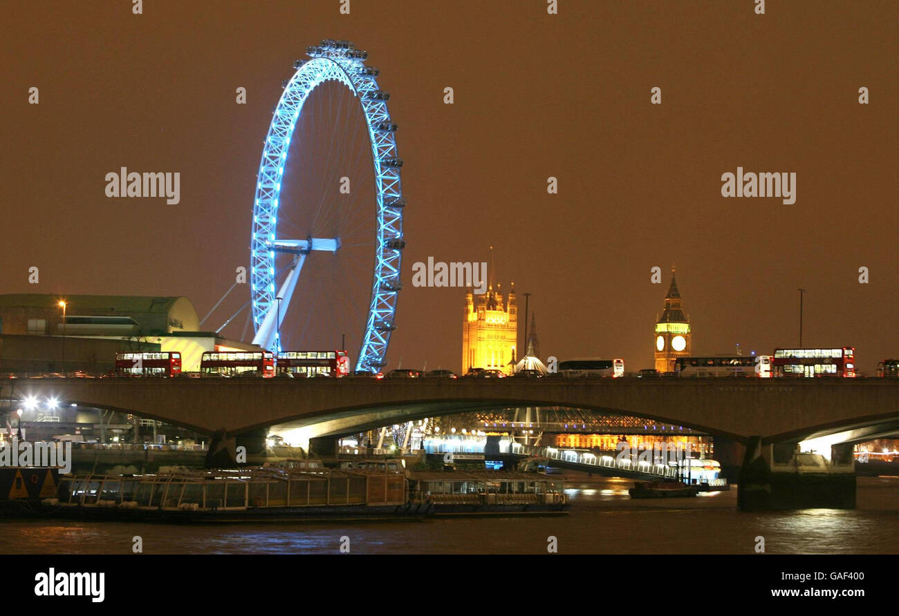 A view by night of Waterloo Bridge crossing the River Thames with a ...