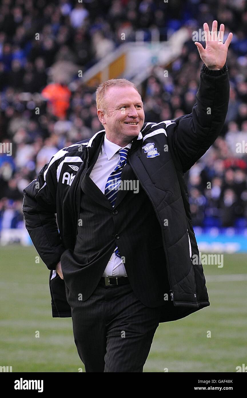 Soccer - Barclays Premier League - Birmingham City v Reading - St Andrews. Birmingham City's manager Alex McLeish waves to the fans as he arrives for his first home game at St Andrews Stock Photo