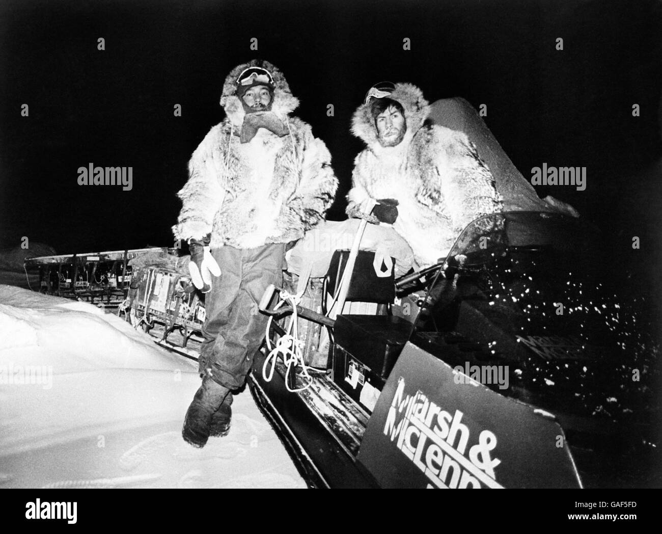 Charles Burton, 39 (left) and Sir Ranulph Fiennes, 37 in the Arctic winter darkness. They are part of the British Transglobe Expedition which is in serious danger of being forced back just a short distance from the North Pole, because of a fire in it's support base at Alert Base, Northern Canada. Leader Sir Ranulph, and Burton are now stranded in temperatures of minus 40c without transport, 450 miles from the Pole with just a weeks supply of food and water. Stock Photo