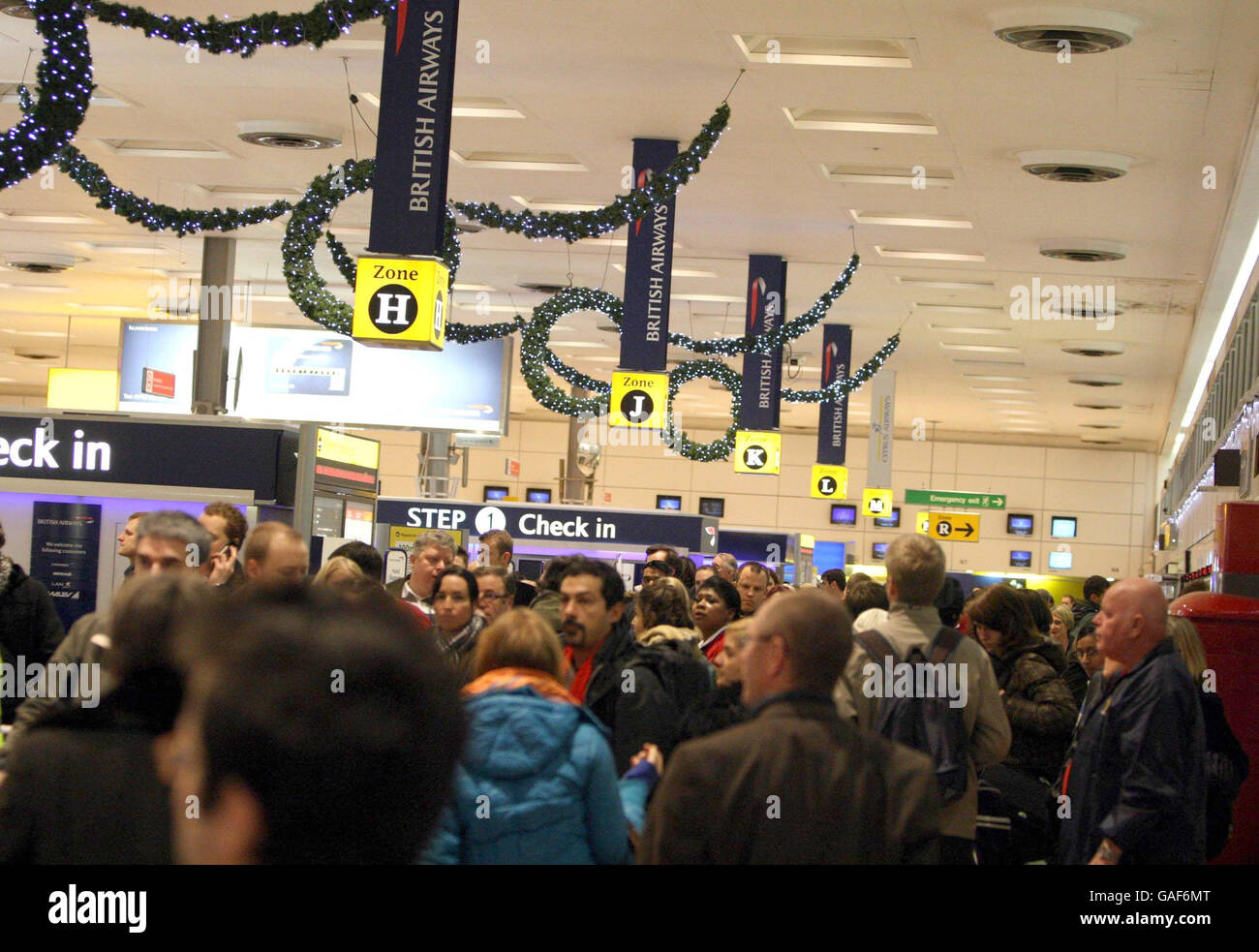 Passengers queue at the checkin desks in readiness to catch their