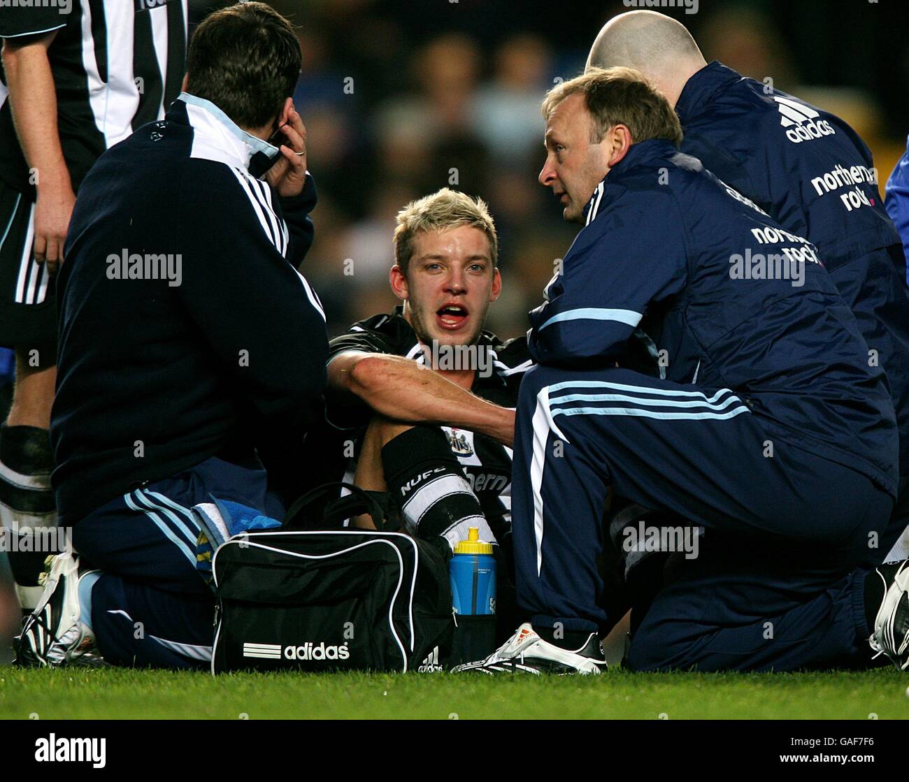 Newcastle United's Alan Smith recieves treatment for an injury Stock Photo  - Alamy