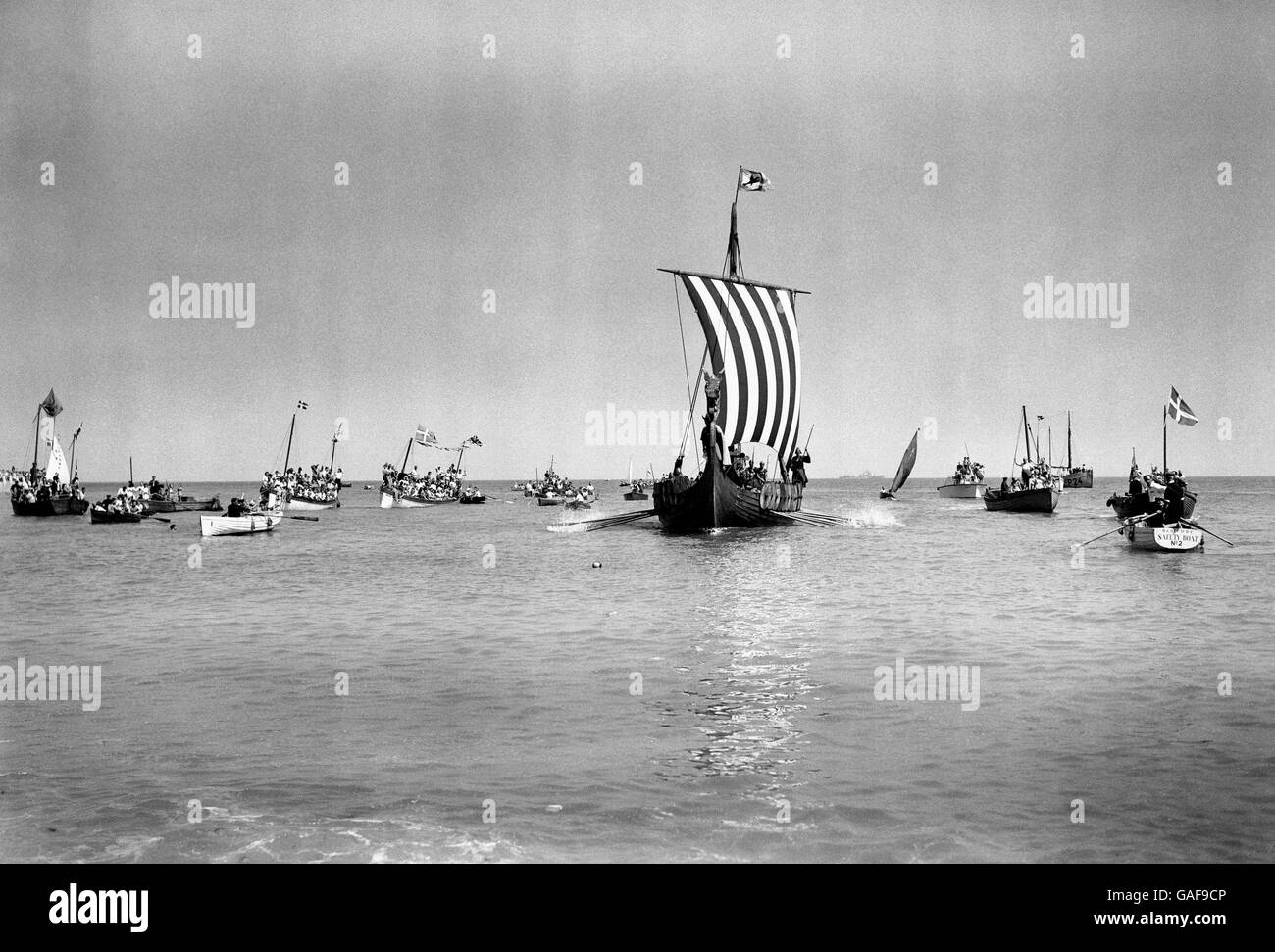 The Viking Ship, surrounded by vessels of all sorts and sizes, making for the beach at Broadstairs. Stock Photo