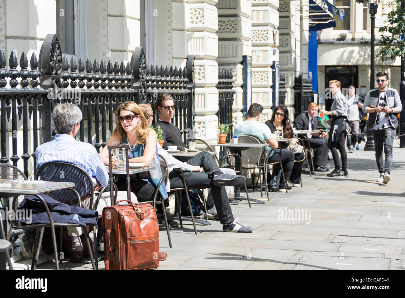 Crowds enjoying cafe life in Garrick Street, London, UK Stock Photo Alamy
