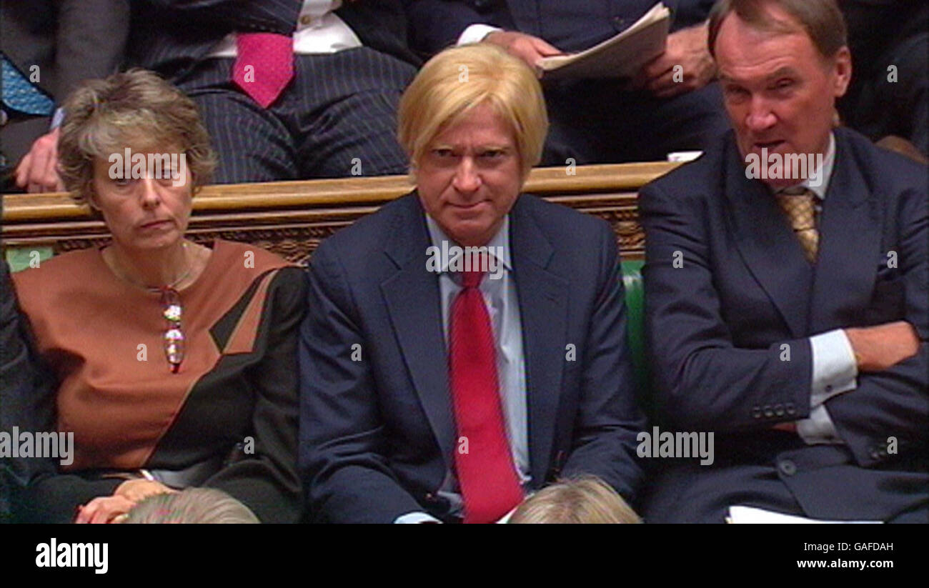 Michael Fabricant MP for Lichfield (centre) listens to Prime Minister Gordon Brown in Prime Minister's Questions in the House of Commons. Stock Photo