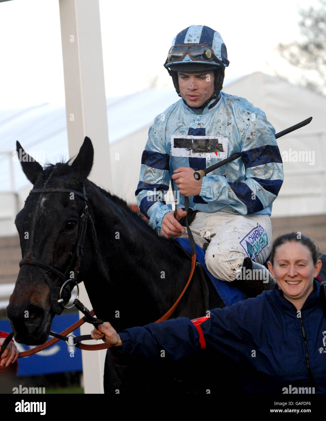 Officier de Reserve ridden by Sam Thomas after winning in the Grundon Recycle Handicap Steeple Chase (class 3) Stock Photo