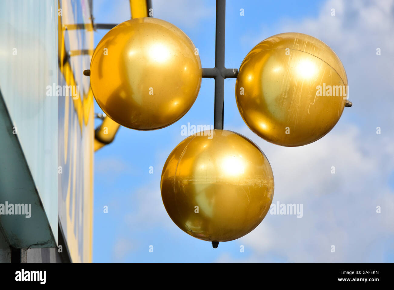 Pawn shop sign of three gold balls above Pawnbroker premises Pawn Barking East London England UK in London Borough of Barking and Dagenham Stock Photo