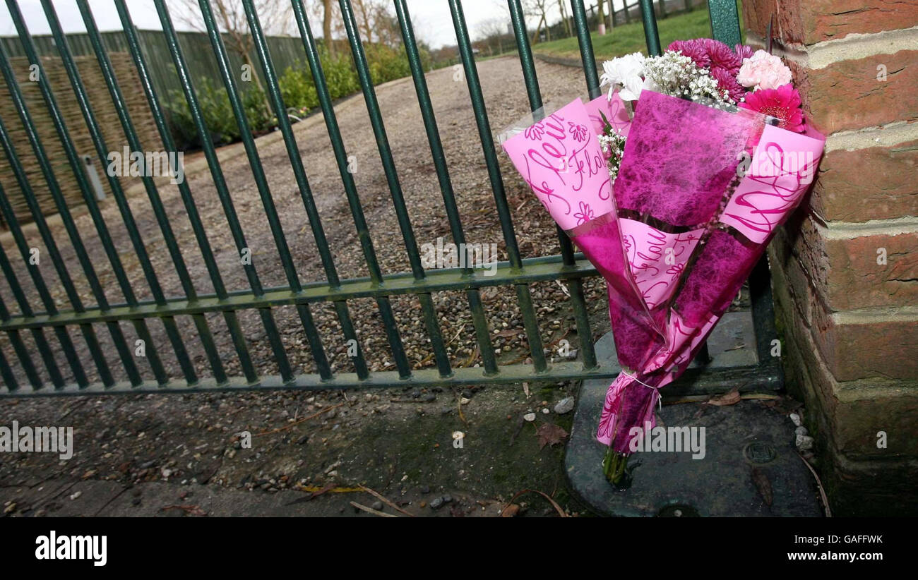 Flowers outside Bluebell Farm near Fingrith Hall Lane in Blackmore, Essex, where a seven-year-old girl was killed on Boxing Day when she was involved in a collision between a Range Rover and a quadbike. Stock Photo