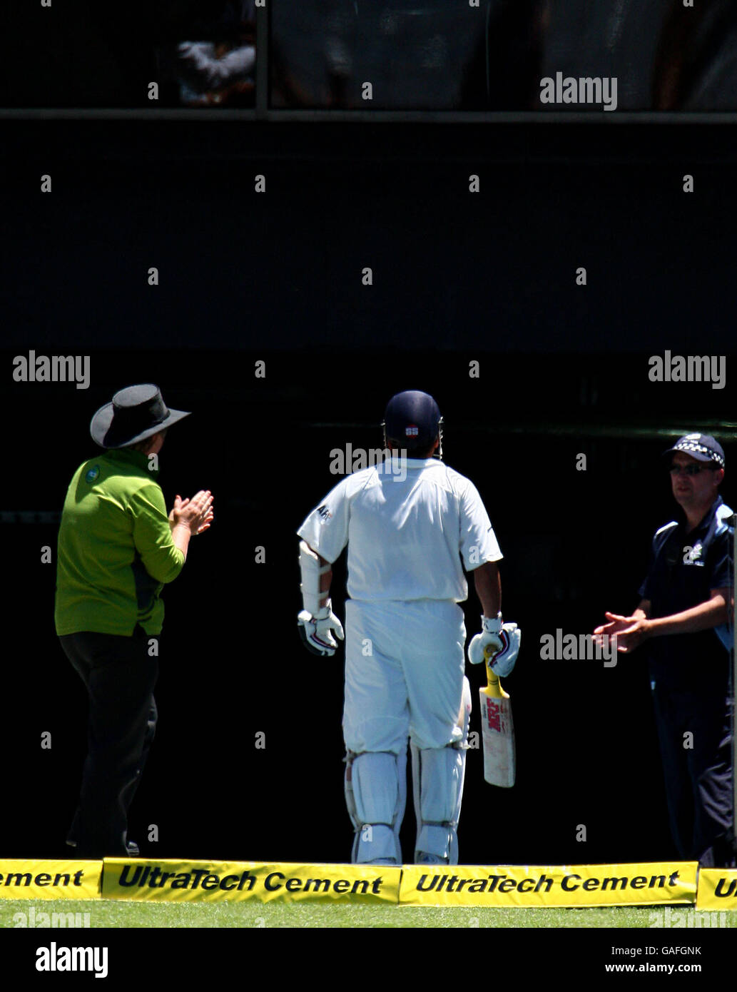 India's Sachin Tendulkar walks off at the MCG possibly for the last time during day four of the 1st Test between Australia and India at the MCG Stock Photo
