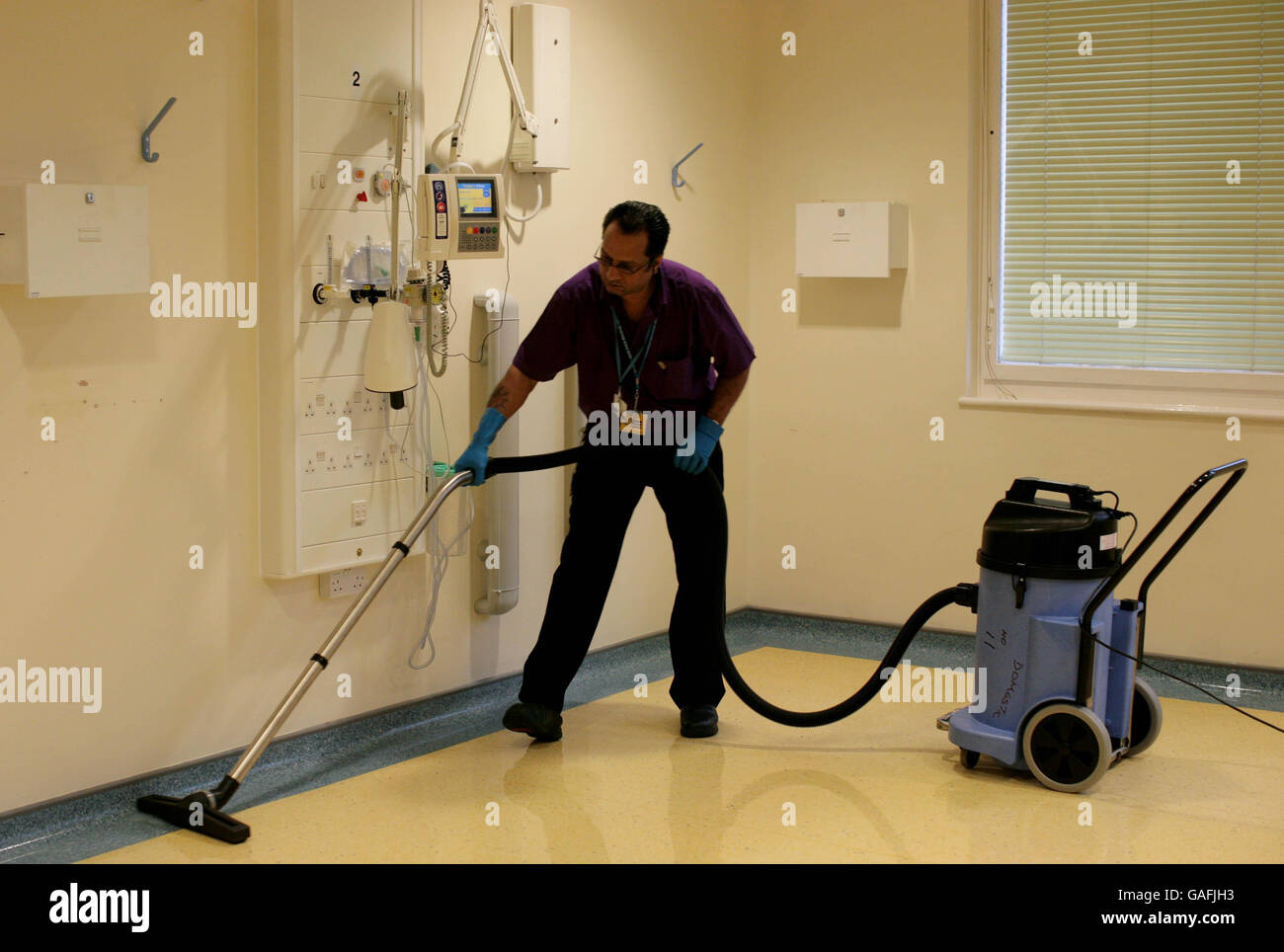 Members of the Domestic floor team deep clean a ward at the Royal Free