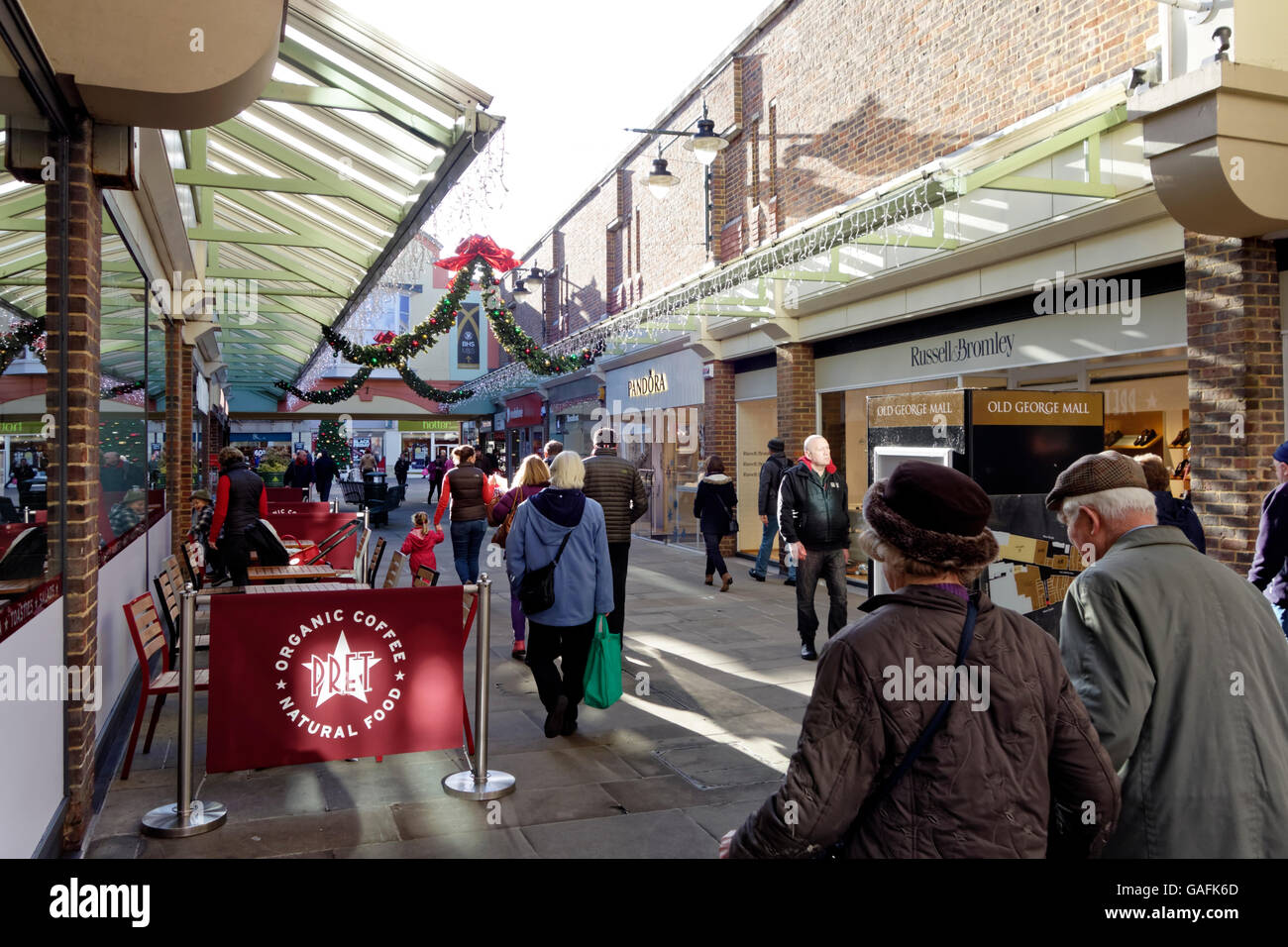 Christmas shoppers at the Old George Mall Modern Shopping Centre in Salisbury, Wiltshire, United Kingdom. Stock Photo