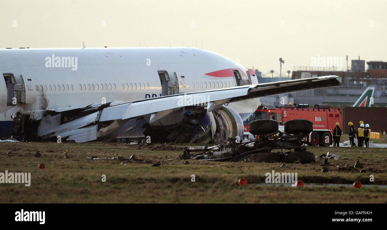 The undercarriage of British Airways Boeing 777 plane flying in from China that has landed short of the runway at Heathrow Airport. Stock Photo