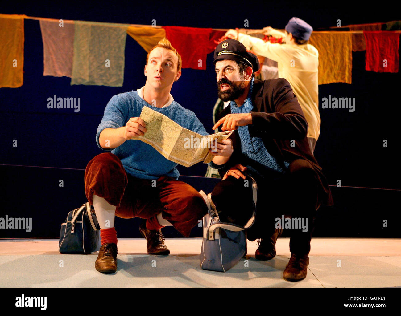 From left to right: Matthew Parish as Tintin and Stephen Finegold as Captain Haddock as the cast of Herge's Adventures of Tintin take part in a photocall at The Playhouse Theatre, London. Stock Photo
