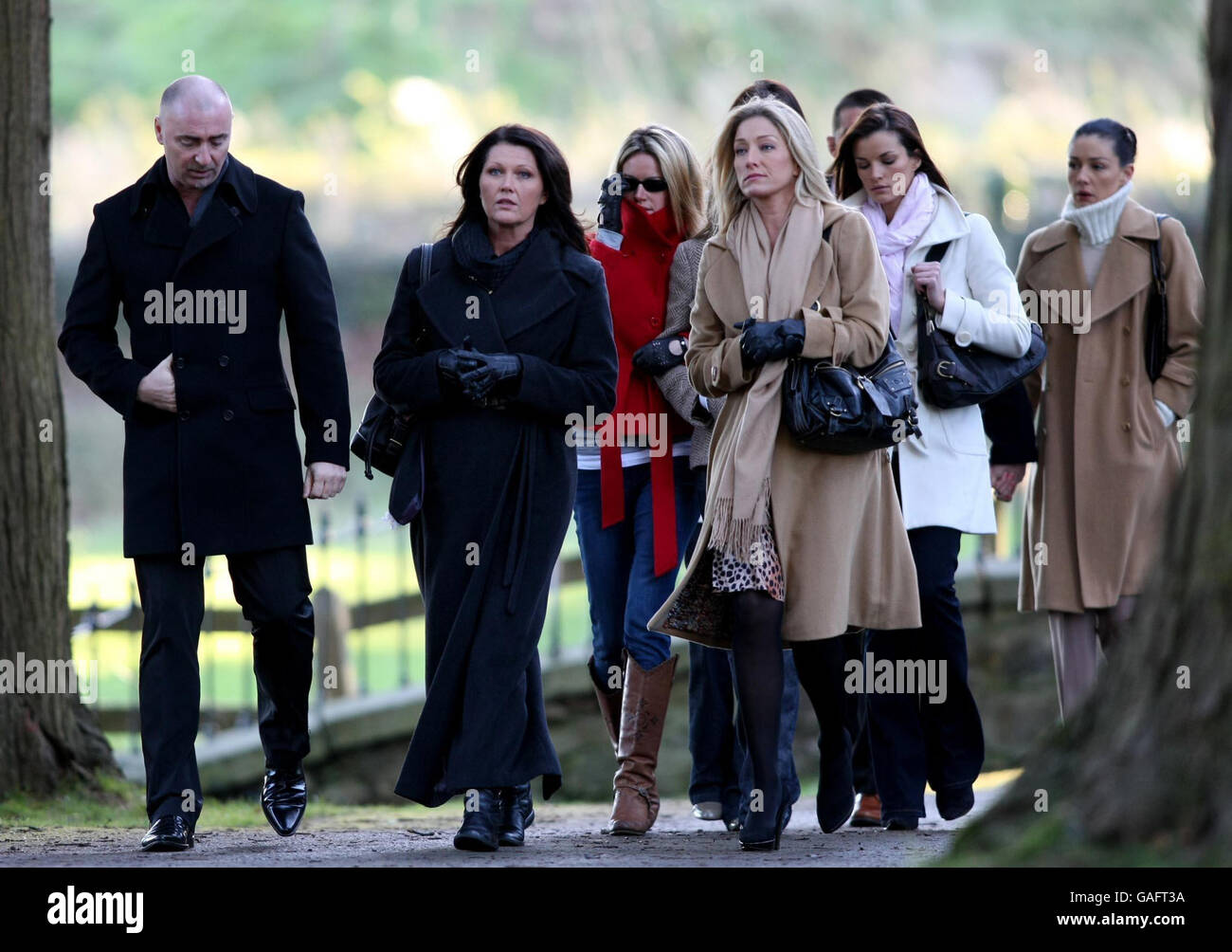 Unidentified mourners arrive for the funeral of model katy french hi