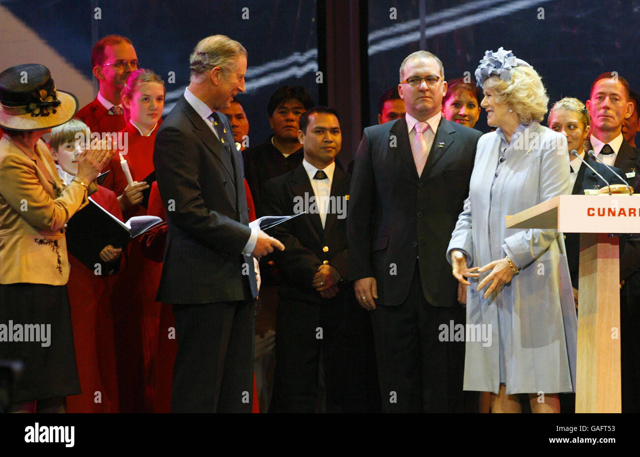HRH The Prince of Wales and HRH The Duchess of Cornwall exchange words after The Duchess named the new Cunard liner the Queen Victoria at Southampton Docks. Stock Photo